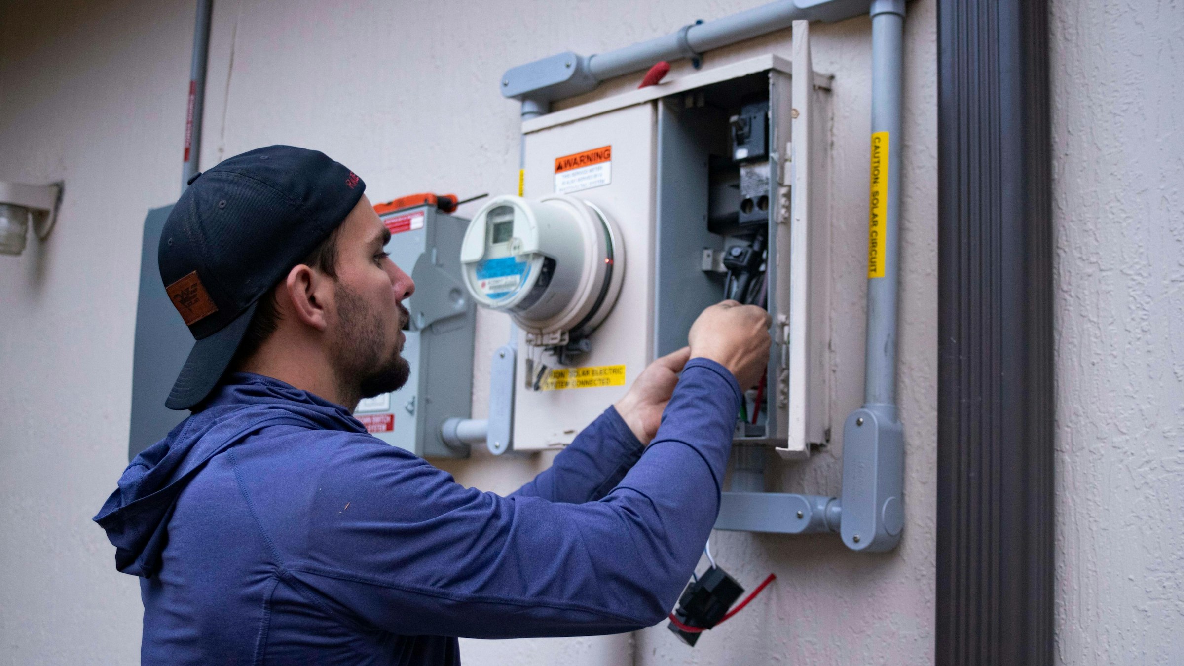 Electrician working on a distribution board